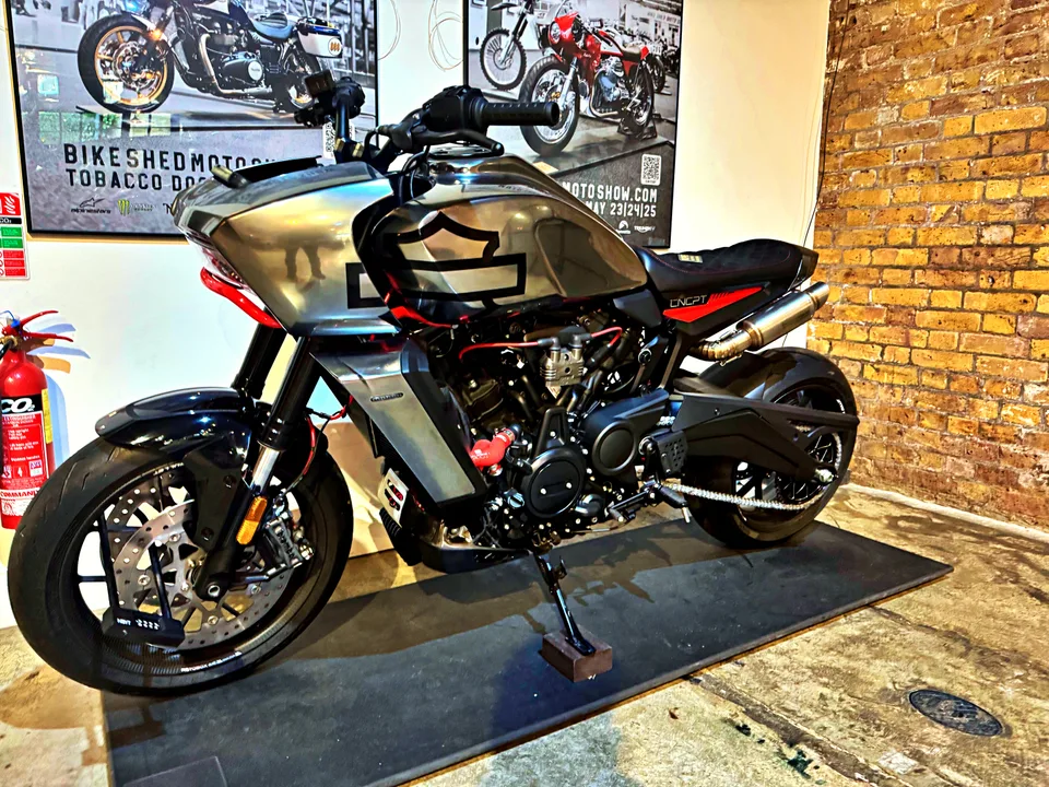Custom motorcycle displayed in a brick interior