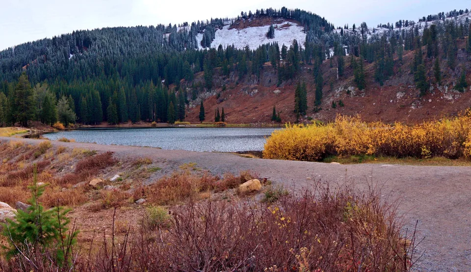 Autumn lake and forested hills
