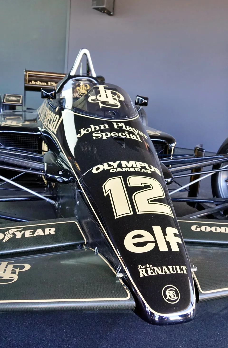 Black and gold single-seat racing car
