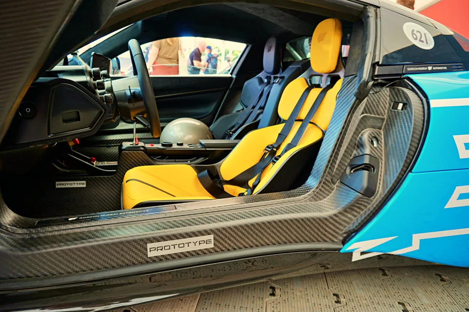 Sports car cabin with yellow seats